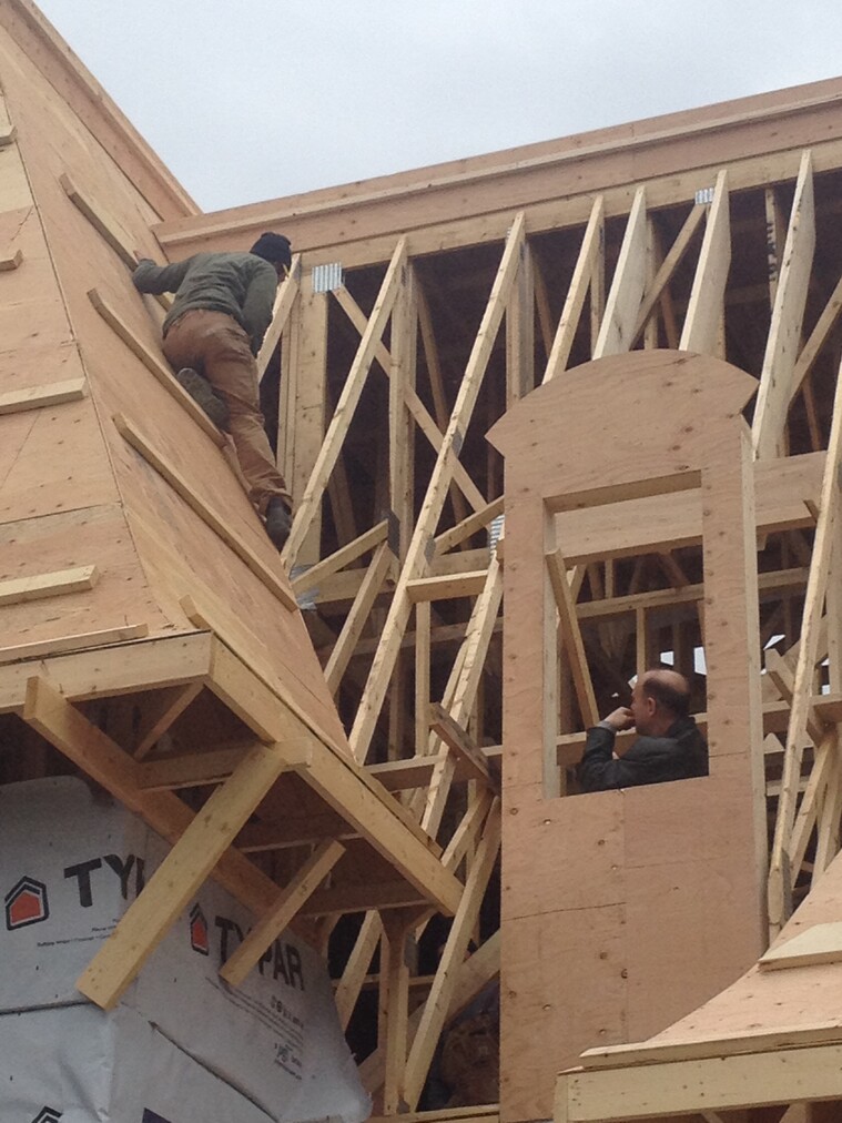 framers sheeting a roof