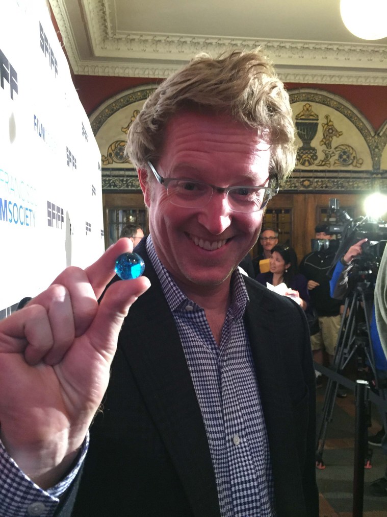 Andrew Stanton, film director, screenwriter, producer and voice actor based at Pixar, receives one blue marble at the Castro Theatre.